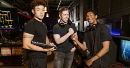 three men looking at the camera